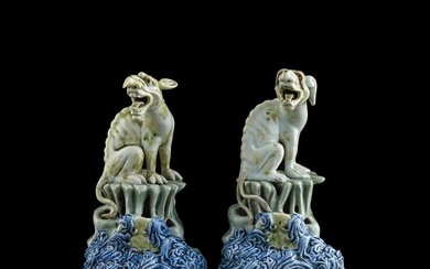 A pair of Chinese carved porcelain beast figures, 19th century