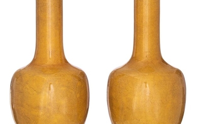 A pair of Chinese incised yellow-glazed 'Dragon' bottle vases, H 33,5 cm