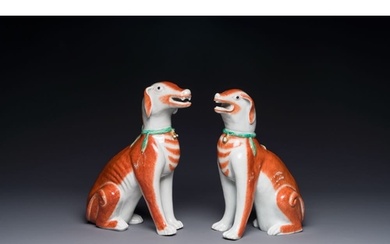 A pair of Chinese polychrome export porcelain models of dogs...