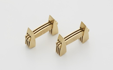 A pair of German hand forged 18k gold "navette" cufflinks with ingenious folding mechanism.