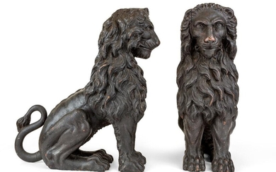 A pair of Italian carved wood models of seated lions, probably 17th century, 53cm high, 44cm long Provenance: with Robin Sanders. The Geoffrey and Fay Elliot collection.