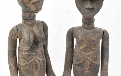 A pair of Lobi, Bukina Faso figures each with articulated...