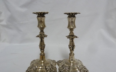 A pair of Victorian silver taper sticks in George II style, ...