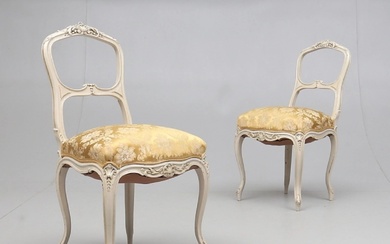 A pair of chairs in the Rococo style. Width: 43cm, Height: 83.5cm, Depth: 88cm, Weight:...