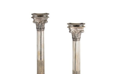 A pair of early 20th century German metalwares silver plated candlesticks