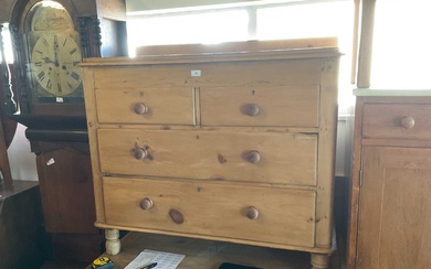 A pine chest of two short over two long drawers,...