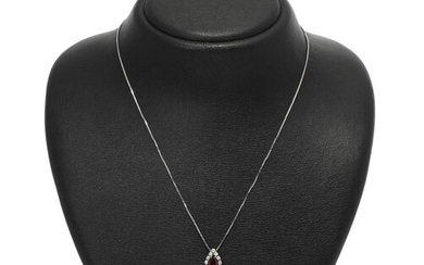 SOLD. A ruby and diamond necklace set with a ruby encircled by numerous diamonds, mounted in 18k white gold. L. max 48 cm. – Bruun Rasmussen Auctioneers of Fine Art