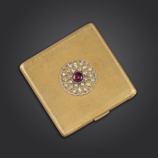A ruby and diamond-set compact by Buccellati, the square case of brushed gold finish with central circular motif set with a cabochon ruby within a single-cut diamond surround, opening to reveal a powder compartment and mirror each within a floral...