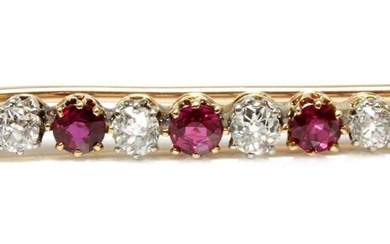 A ruby and diamond two colour bar brooch