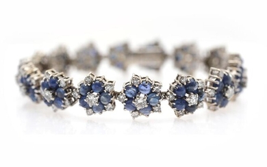 NOT SOLD. A sapphire and diamond bracelet set with numerous sapphires encircled by numerous diamonds, mounted in 18k white gold. L. app. 18.5 cm. – Bruun Rasmussen Auctioneers of Fine Art