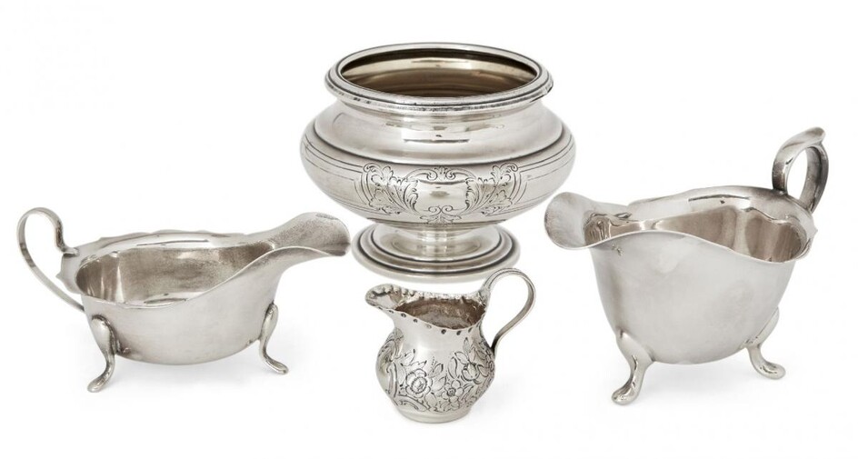 A small Victorian silver cream jug, London, c.1887, Lambert & Co., repousse decorated with flowers and with vacant cartouche beneath pouring lip, the base stamped Lambert, Coventry, approx. 5.5cm high, together with an American sugar bowl by Hansel...