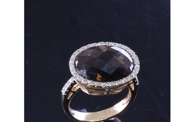 A smoky quartz & diamond ring with a valuation from C Clake ...