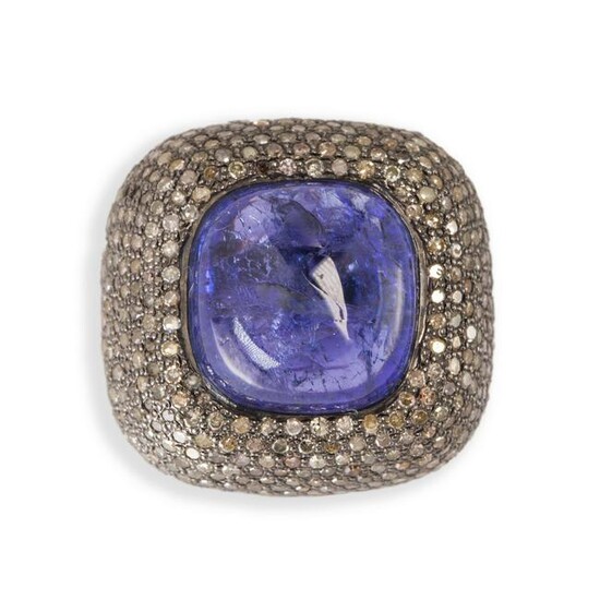 A tanzanite, diamond and sterling silver ring