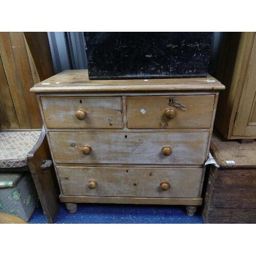 A vintage pine Chest of Drawers, with two short drawers over...