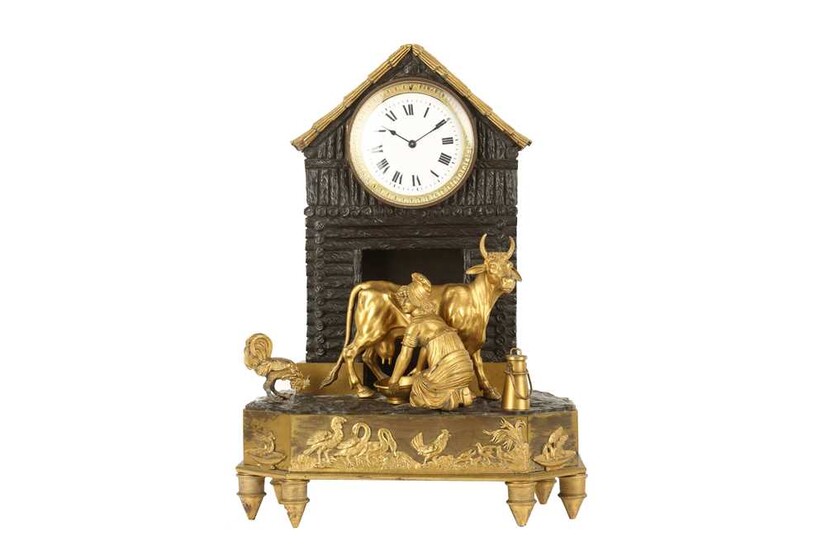 AN EARLY 19TH CENTURY FRENCH EMPIRE PERIOD GILT AND PATINATED BRONZE FIGURAL MANTEL CLOCK 'THE MILKMAID'