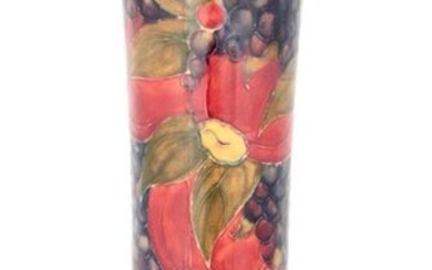 AN EARLY WILLIAM MOORCROFT FLARED TALL SLENDER VASE WITH SWOLLEN...