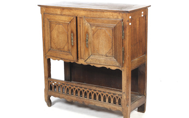 An 18/19th century French wooden two door sideboard.