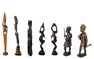 An African hardwood carved figure of a hunter. Height 29cm t...