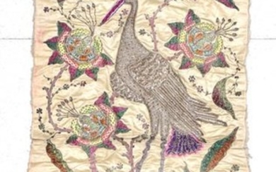 An Early 20th Century Indian Embroidered Panel, worked on cream...