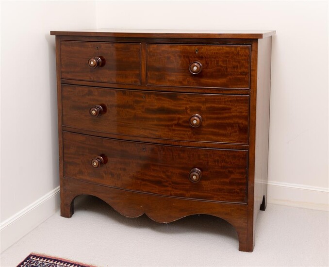 An antique mahogany chest of two short and two long...