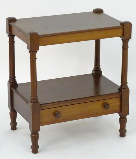 An early 19thC mahogany whatnot / trolley with a