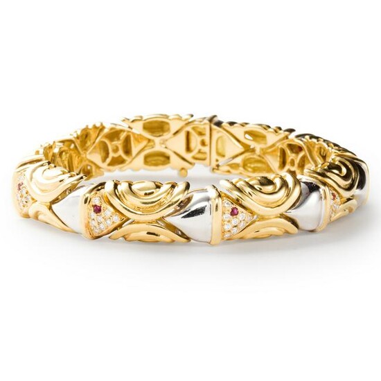 An eighteen karat bi-color gold bracelet