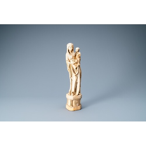 An ivory figure of a Madonna with child, probably France, 15...