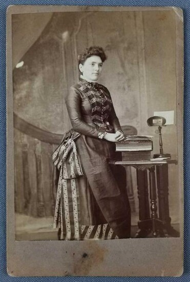 Antique photograph of woman with stereoscope