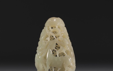 China - Carved and openworked white jade pendant with animal...