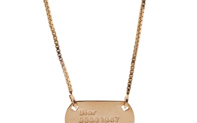 Christian Dior, a New Look 1947 dog tag necklace, the gold-t...
