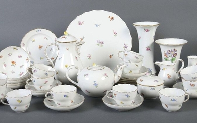 Coffee set ''Streublümchen'' for 12 persons Meissen, mostly after 1934 (two parts 1860-1924, one part Pfeiffer period), porcelain, glazed, with strewing flower decor respectively one part with flower bouquet in onglaze painting, the knobs in form of...