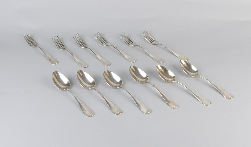 Cutlery plated with 6 spoons and 6 forks at the back