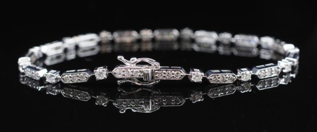 Diamond and 18ct white gold line bracelet approx length 18cm...