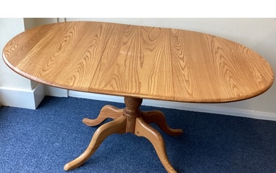 ERCOL: A good draw leaf table of typical form. Est. £100 - £...