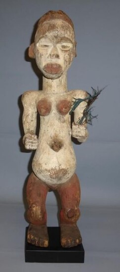 Female figure, Tsogho (Gabon), red and white pigmented wood, feather, (woodworm attacks) - H. 61 cm