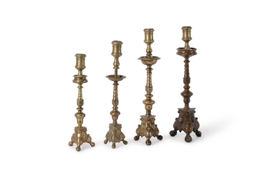 Four assorted Italian gilt bronze pricket altar sticks