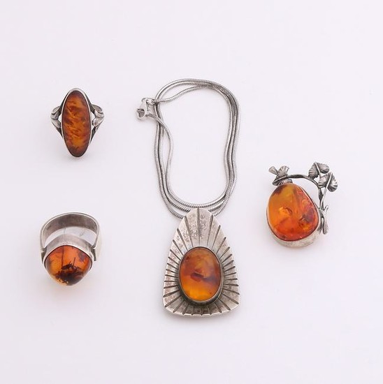 Four silver jewelry with amber. a snake necklace with a