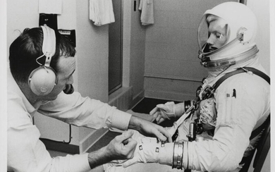 [Gemini VIII] Neil Armstrong preparing for his first space mission: the first...