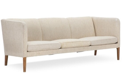 SOLD. Hans J. Wegner: “AP 18”. Freestanding three seater sofa with legs of patinated oak. Upholstered with light wool. – Bruun Rasmussen Auctioneers of Fine Art