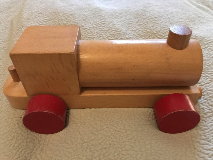 Kay Bojesen: A toy partially painted wooden locomotive. Stamped Kay Bojesen. H. app. 10 cm. L. app. 24 cm.