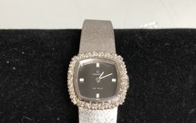 OMEGA. Ladies' bracelet watch in white gold and...