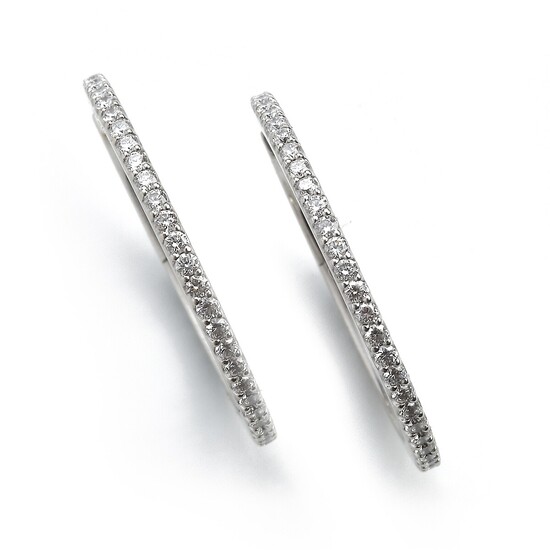 Ole Lynggaard: A pair of diamond ear pendants “Love” each set with numerous brilliant-cut diamonds, mounted in 18k white gold. Design Charlotte Lynggaard.