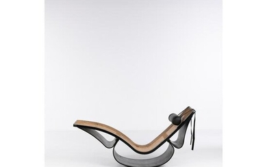 Oscar Niemeyer (1907-2012) Rio Rocking chair Painted plywood and caning Model created in the 1970s H