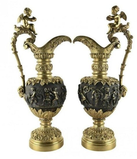 PAIR OF DORE AND PATINATED BRONZE EWERS