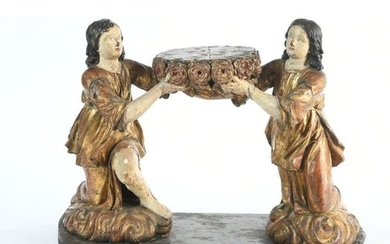 PAIR OF Draped CHARACTERS holding an altar decorated...