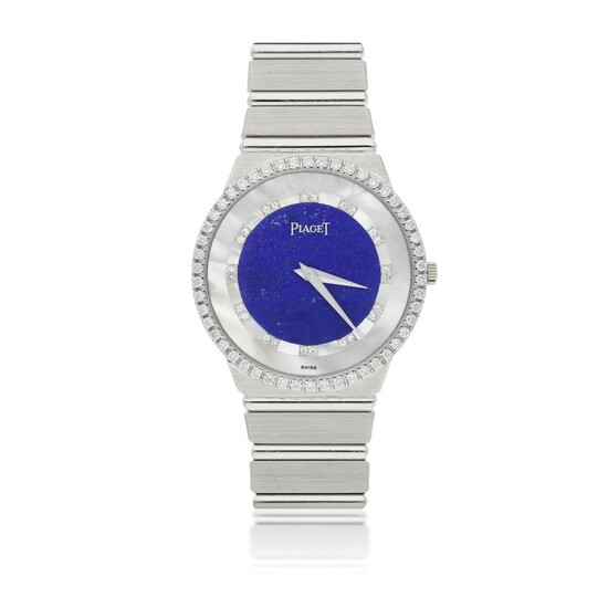 PIAGET | A WHITE GOLD AND DIAMOND SET BRACELET WATCH WITH LAPIS LAZULI AND MOTHER OF PEARL DIAL CIRCA 1980