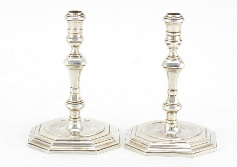 Pair of 18th century design cast silver candlesticks, B