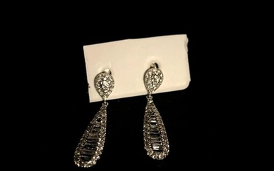 Pair of EARRINGS in white gold, adorned with eighty modern...