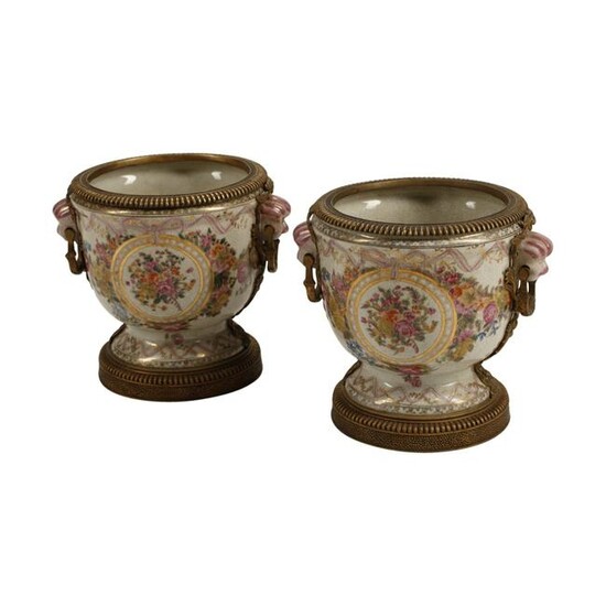 Pair of Porcelain Cache Pots with Bronze Mounts.