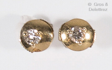 Pair of yellow gold ear chips, each adorned with a...